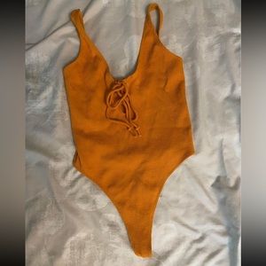 Urban outfitters orange bodysuit